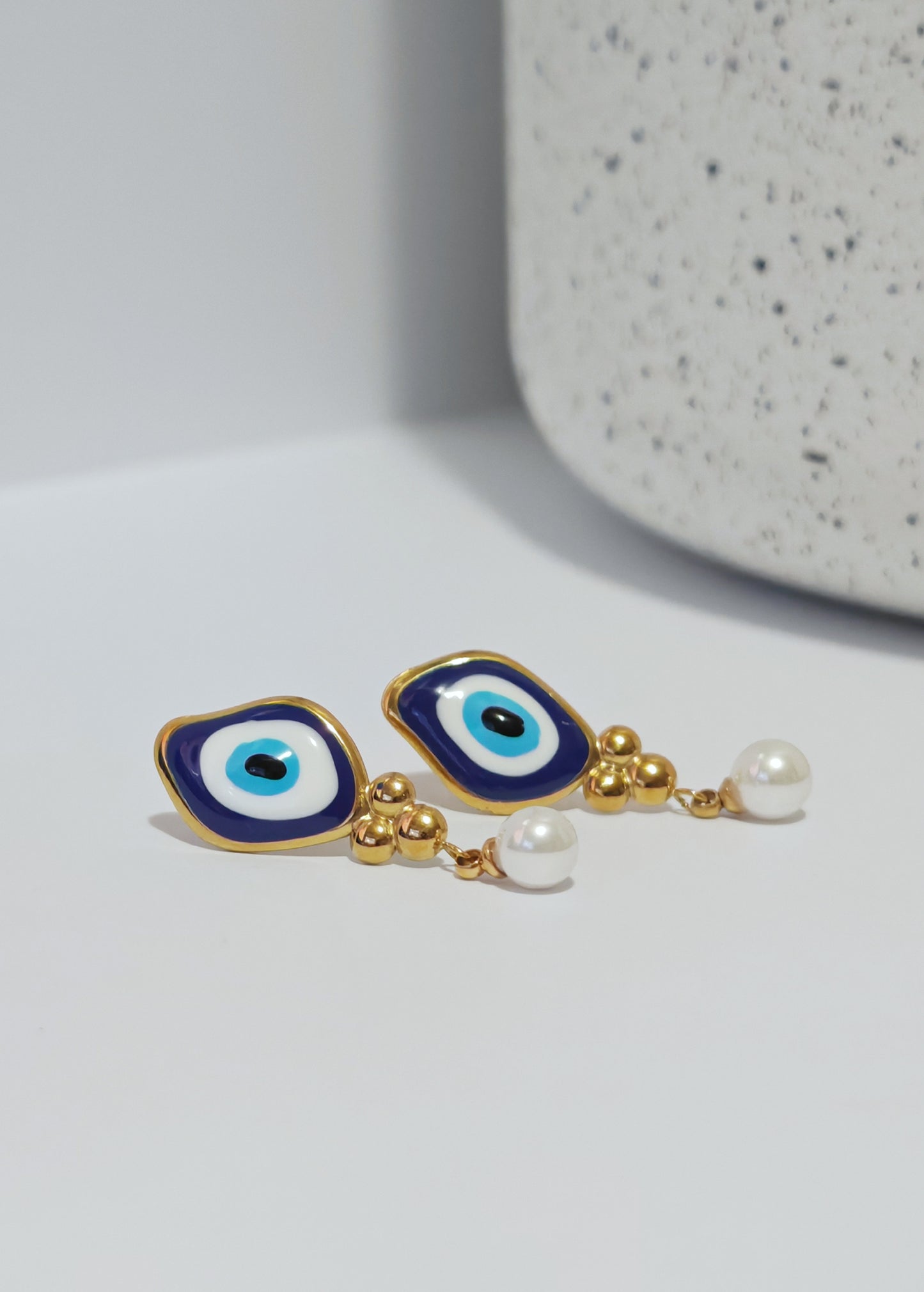 Aretes Protección