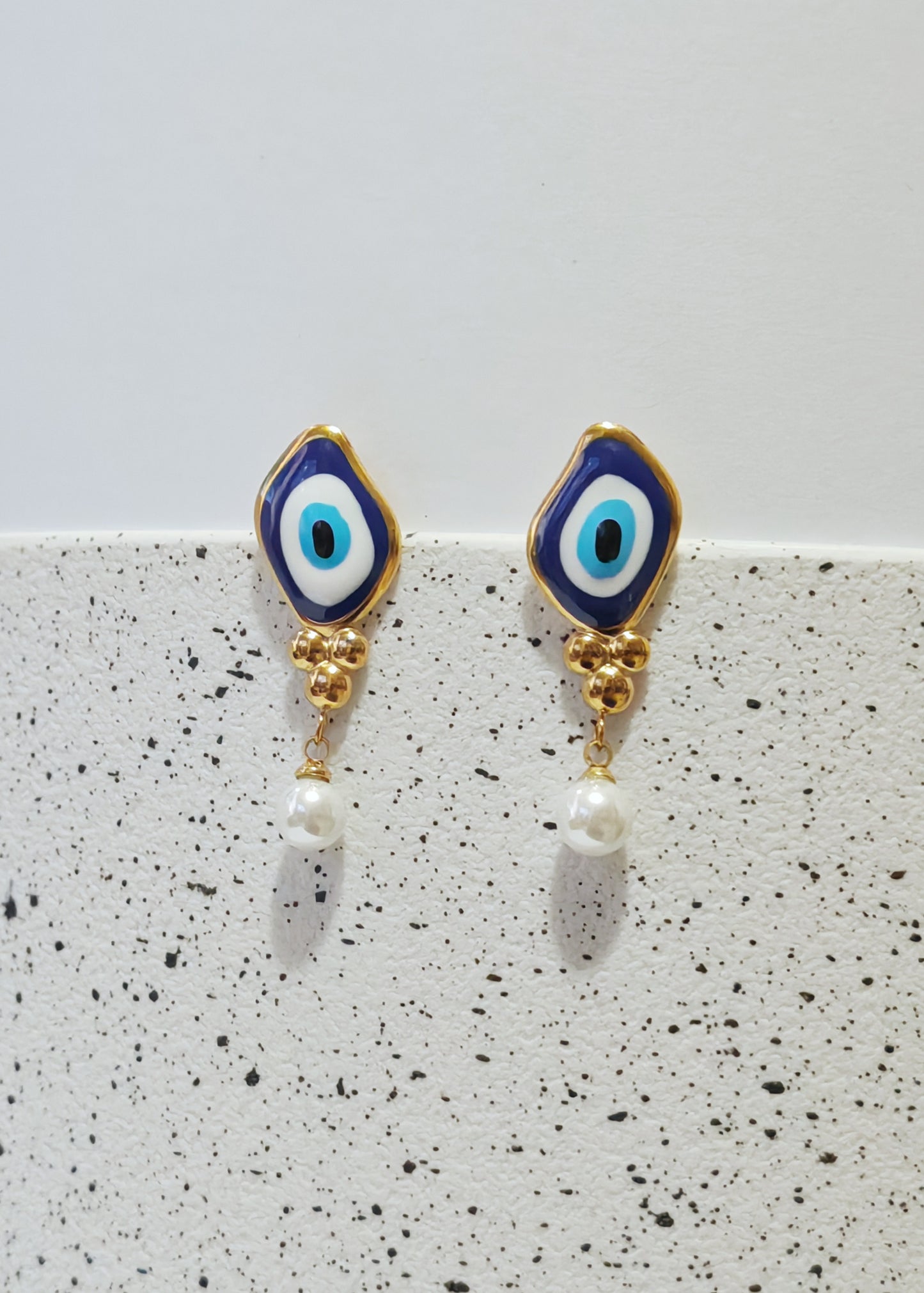 Aretes Protección